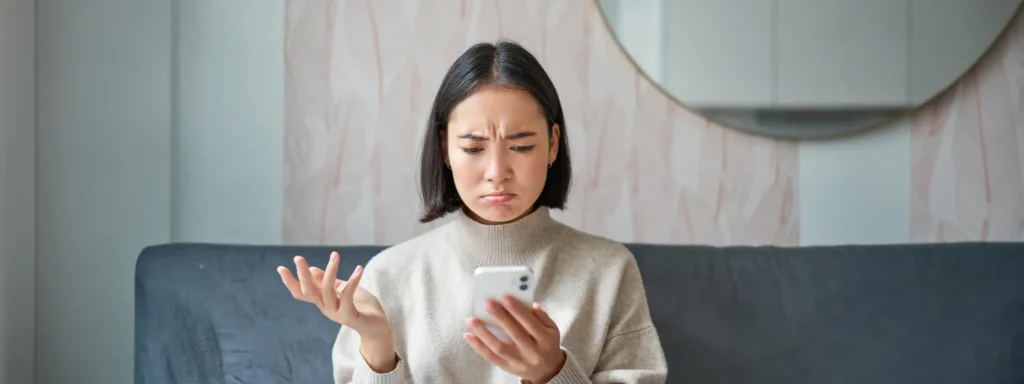 korean female looking at phone
